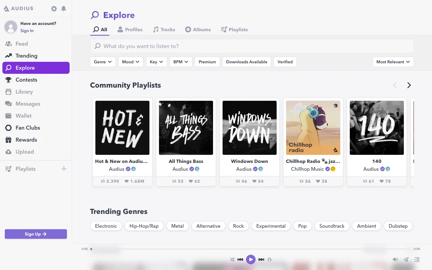 Audius Explore public page showing community playlists, genre filters, tracks, albums, and download availability